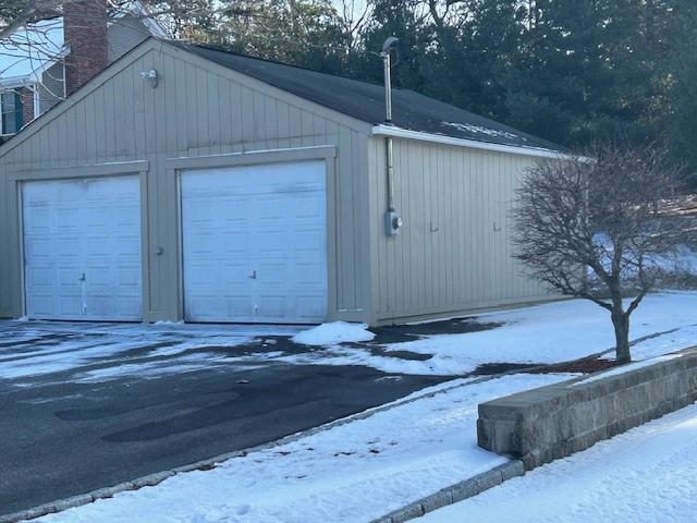 view of snow covered garage