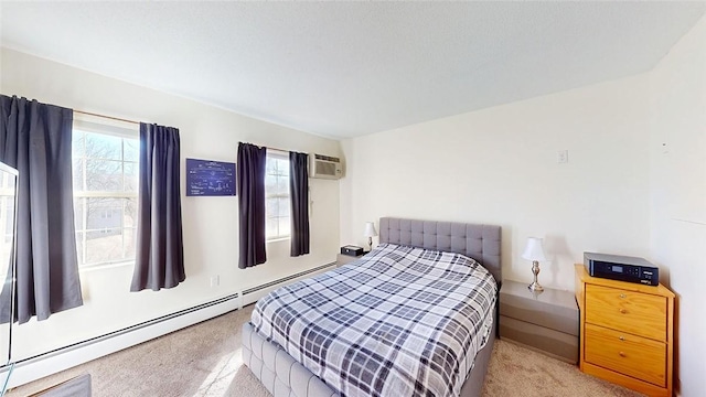 carpeted bedroom with a wall mounted AC and baseboard heating