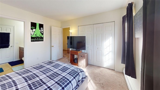 carpeted bedroom featuring a closet