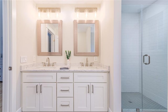 bathroom with vanity and walk in shower