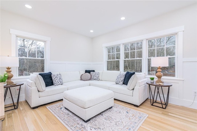 living room with light hardwood / wood-style flooring