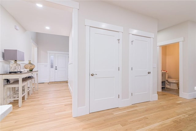 hallway featuring light wood-type flooring