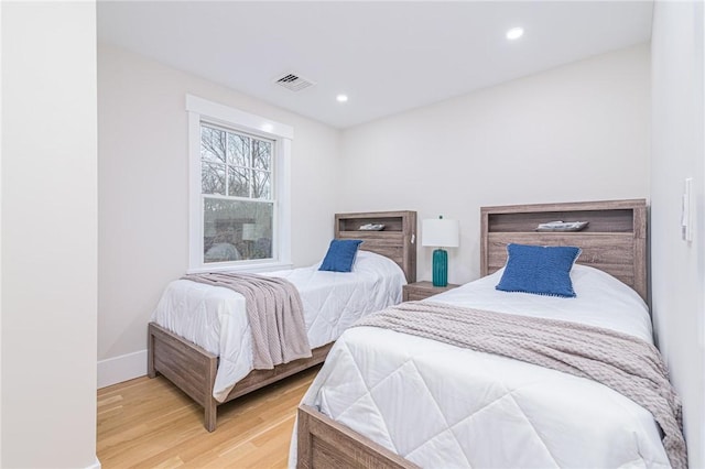 bedroom featuring hardwood / wood-style floors