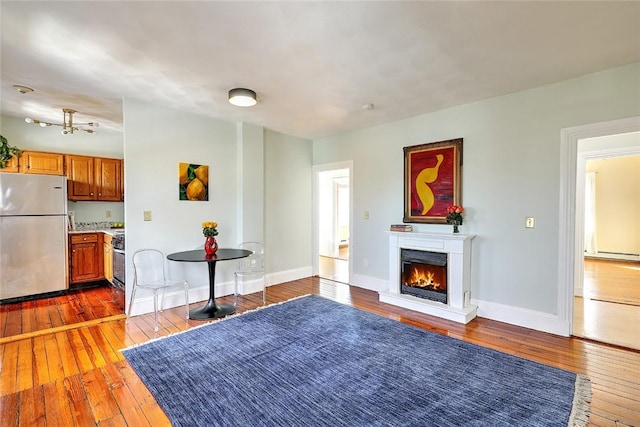 unfurnished living room with dark hardwood / wood-style flooring