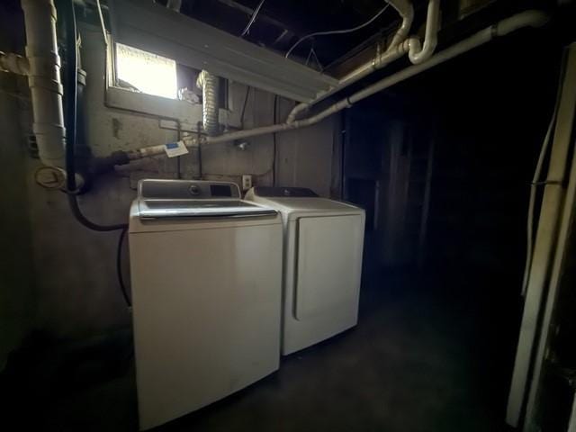 washroom featuring independent washer and dryer