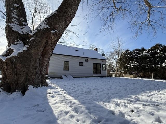 view of snow covered property