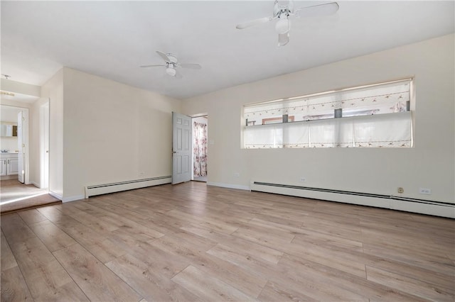 empty room featuring ceiling fan, a baseboard radiator, and light hardwood / wood-style flooring