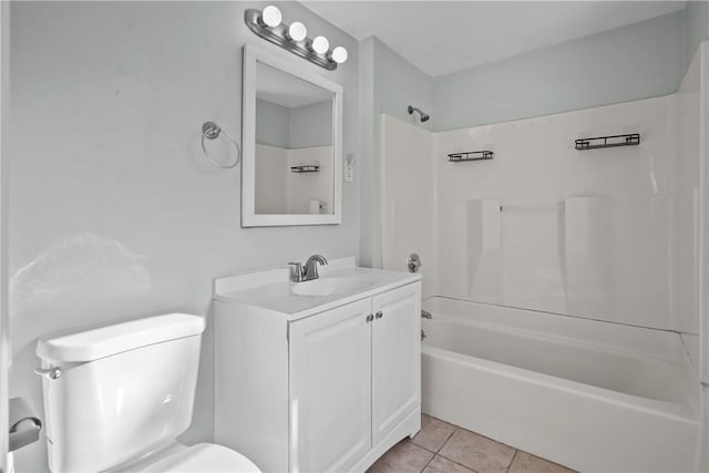 full bathroom featuring vanity, tile patterned floors, toilet, and shower / bath combination