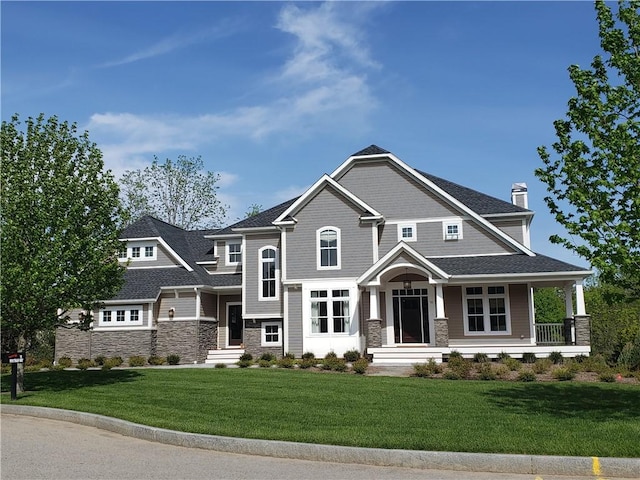 craftsman house featuring a front yard