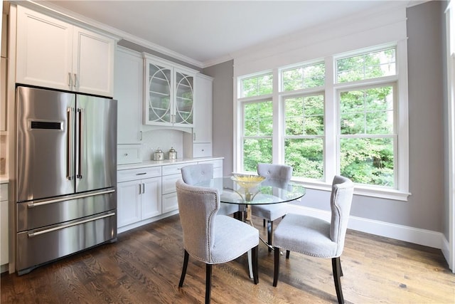 00 Tipping Rock Dr, East Greenwich, RI 02818 - dining area featuring ornamental molding and dark wood-type flooring