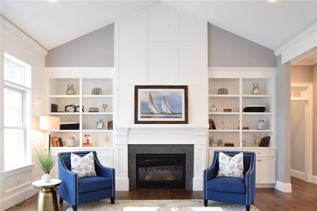 00 Tipping Rock Dr, East Greenwich, RI 02818 - living area featuring lofted ceiling, dark wood-type flooring, and built in features