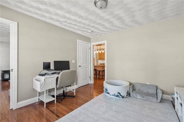 office space featuring hardwood / wood-style floors