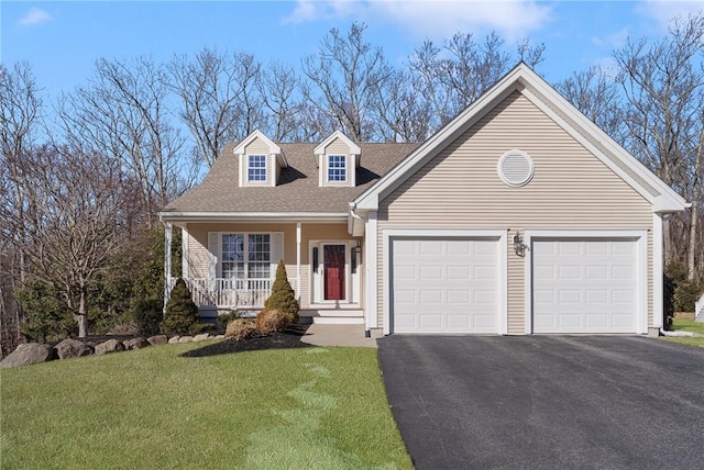 cape cod-style house with driveway, roof with shingles, an attached garage, a porch, and a front yard