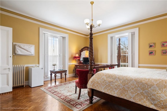 bedroom featuring radiator, crown molding, and parquet floors