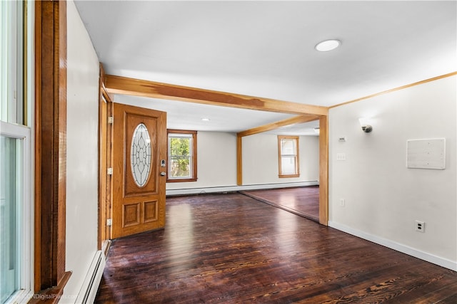 foyer featuring a baseboard heating unit and dark hardwood / wood-style floors