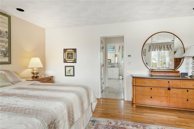 bedroom featuring light hardwood / wood-style floors