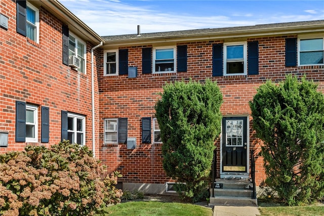 view of front of home featuring cooling unit