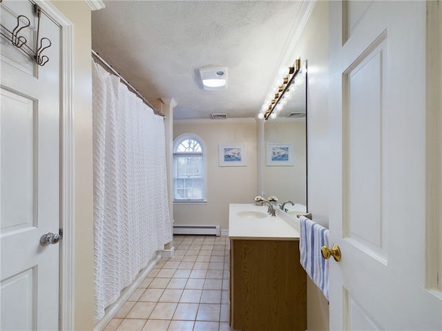 bathroom with tile patterned flooring, vanity, ornamental molding, a textured ceiling, and a baseboard radiator