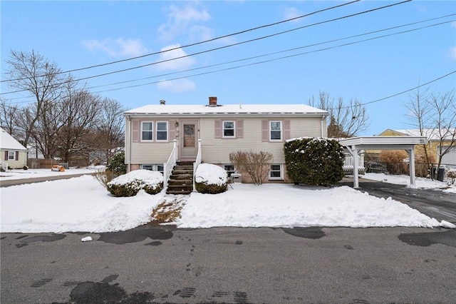 view of front of house featuring a carport