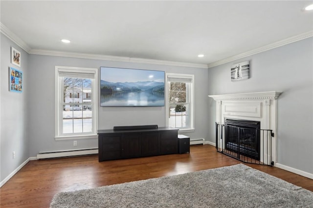 unfurnished living room featuring a baseboard radiator, plenty of natural light, and dark hardwood / wood-style floors