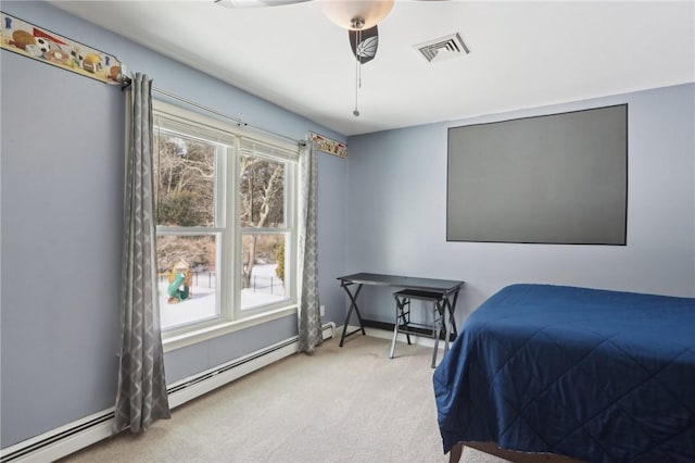 bedroom featuring a baseboard radiator and carpet