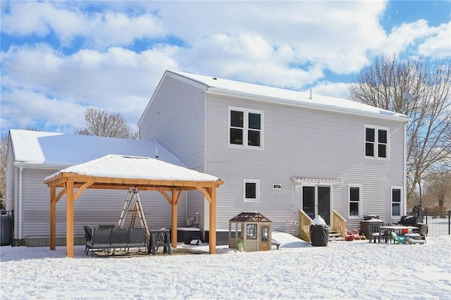 view of snow covered property