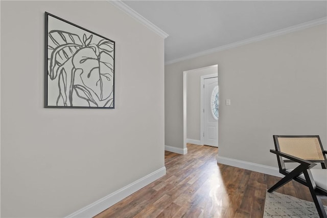 interior space featuring hardwood / wood-style flooring and ornamental molding