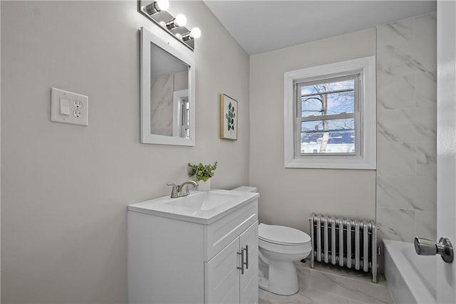 full bathroom featuring washtub / shower combination, vanity, toilet, and radiator