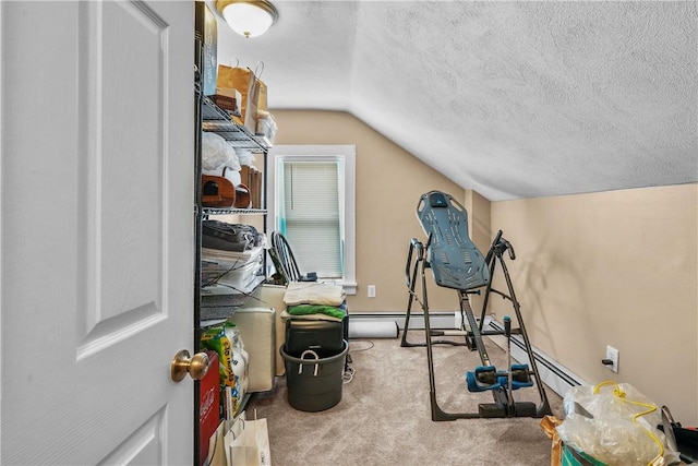 workout room with light colored carpet, vaulted ceiling, a textured ceiling, and a baseboard heating unit