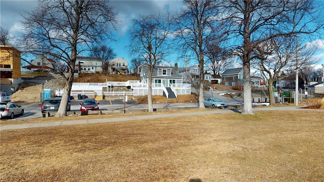 view of yard featuring a residential view