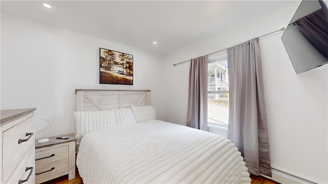 bedroom with a baseboard radiator