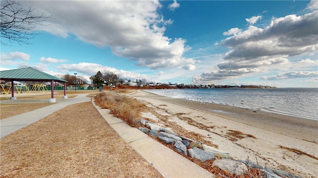 water view featuring a gazebo and a view of the beach
