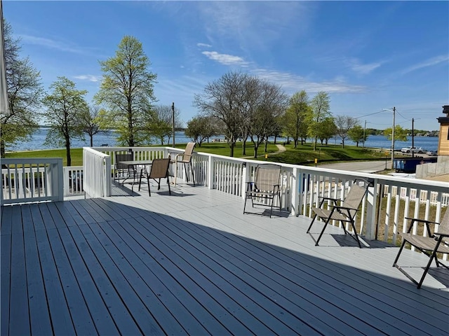 wooden terrace with a water view