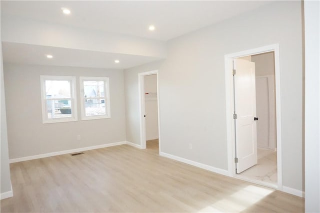 empty room with light wood-type flooring