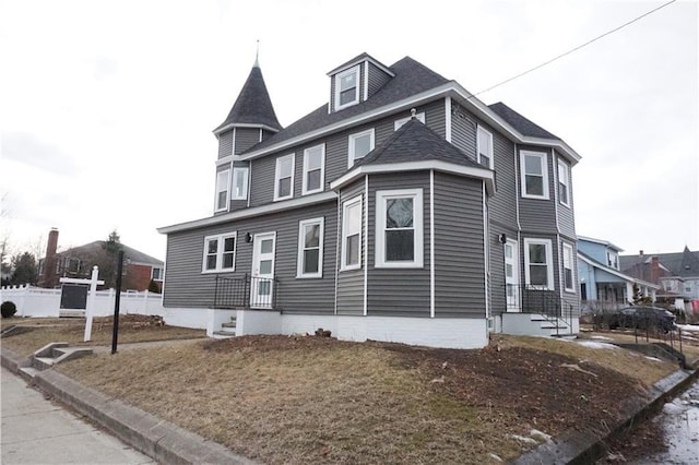 victorian house with fence