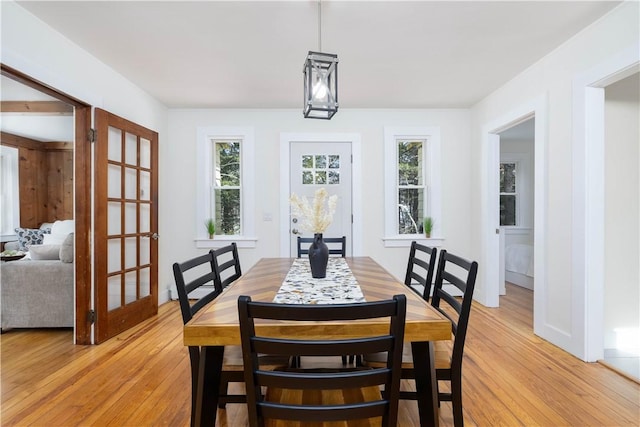 dining area featuring light wood-type flooring