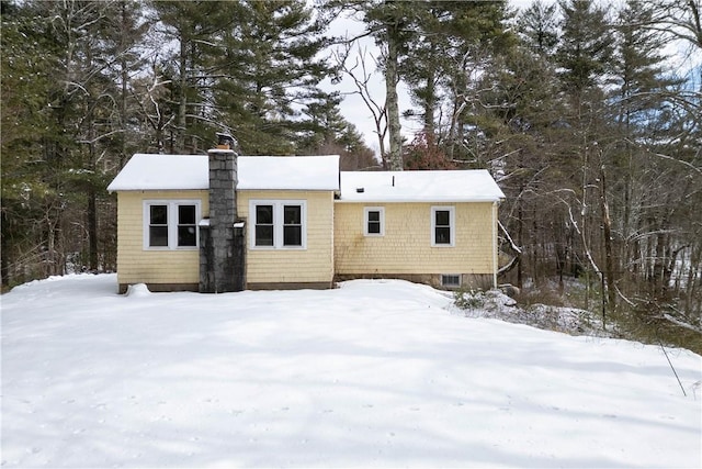 view of snow covered property