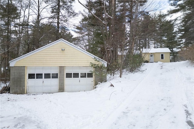 view of snow covered garage