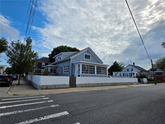 36 Utton Ave, Pawtucket, RI 02860 - view of front facade featuring a fenced front yard