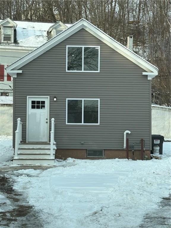 view of snow covered property