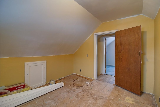 bonus room featuring vaulted ceiling