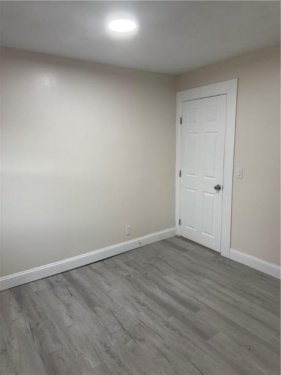 empty room with light wood-type flooring