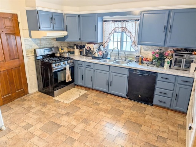 kitchen featuring black dishwasher, stainless steel gas range oven, light countertops, under cabinet range hood, and a sink