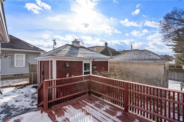 view of snow covered deck