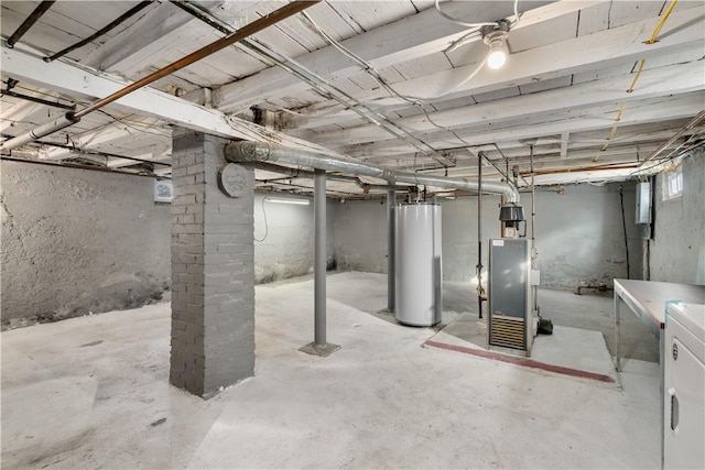 basement with washer / clothes dryer and water heater