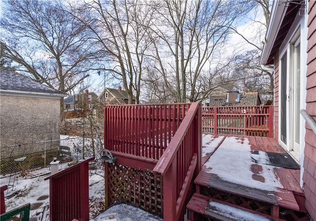 view of snow covered deck