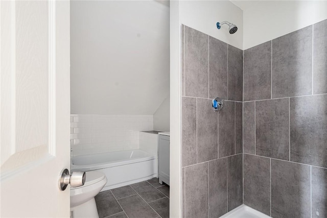 bathroom featuring separate shower and tub, tile patterned floors, and toilet