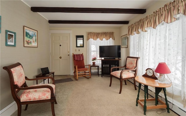 living area with beamed ceiling, carpet floors, and baseboard heating