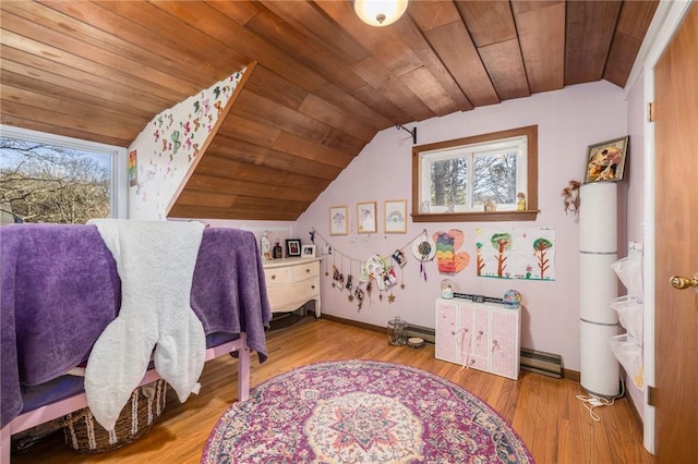 bedroom with multiple windows, lofted ceiling, wood ceiling, and light hardwood / wood-style flooring