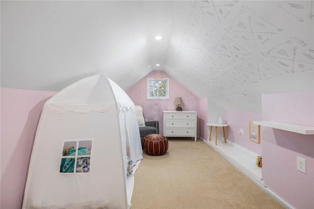 carpeted bedroom featuring lofted ceiling